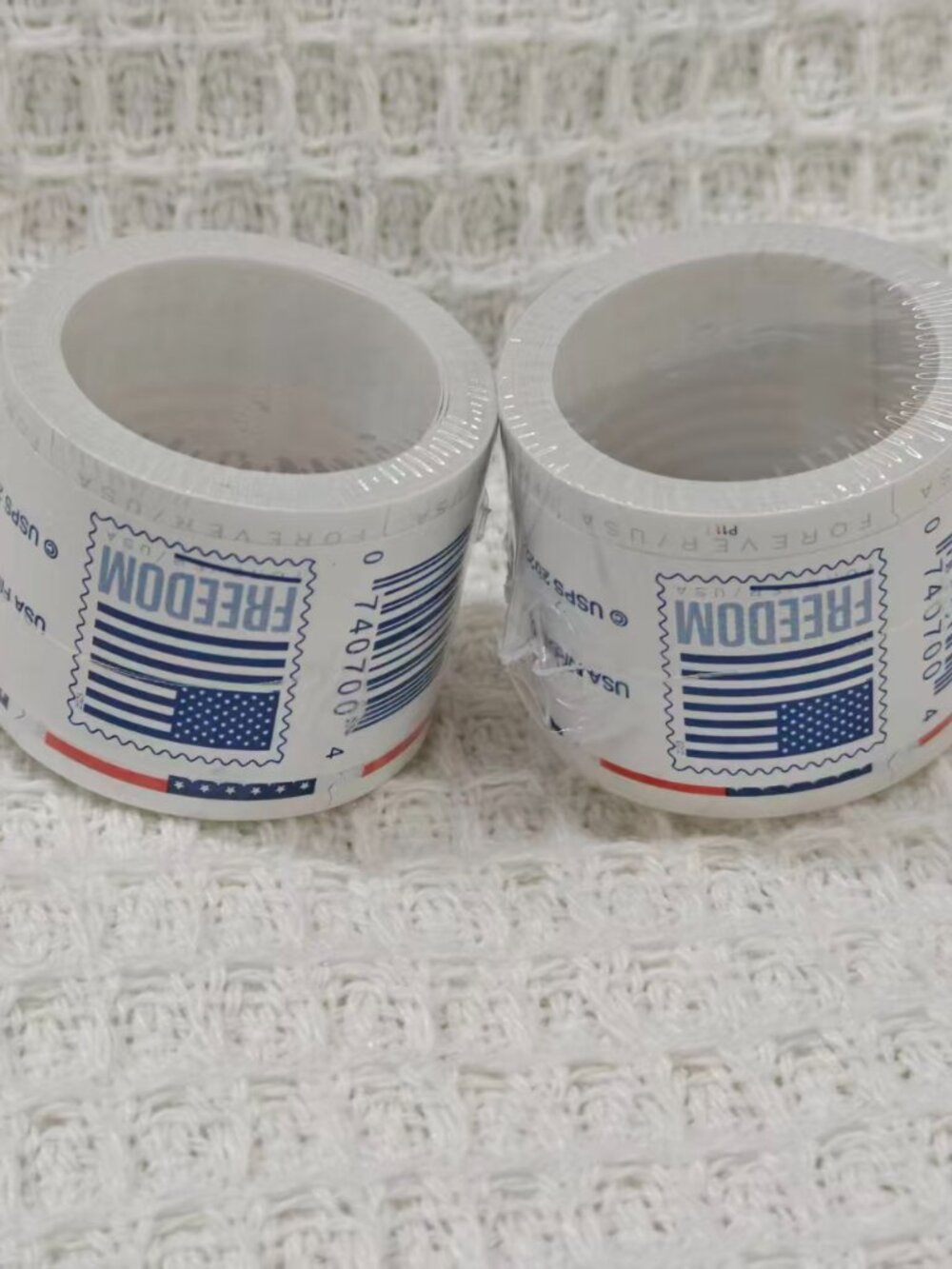 2 rolls of USPS stamps, 200 brand new stamps in total